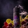 زجاجة نكهة فيب عنب اكستريم Grape Xtrem Vape عموديا مع عنب وبخار زجاجة نكهة فيب عنب اكستريم Grape Xtrem Vape عموديا مع عنب وبخار